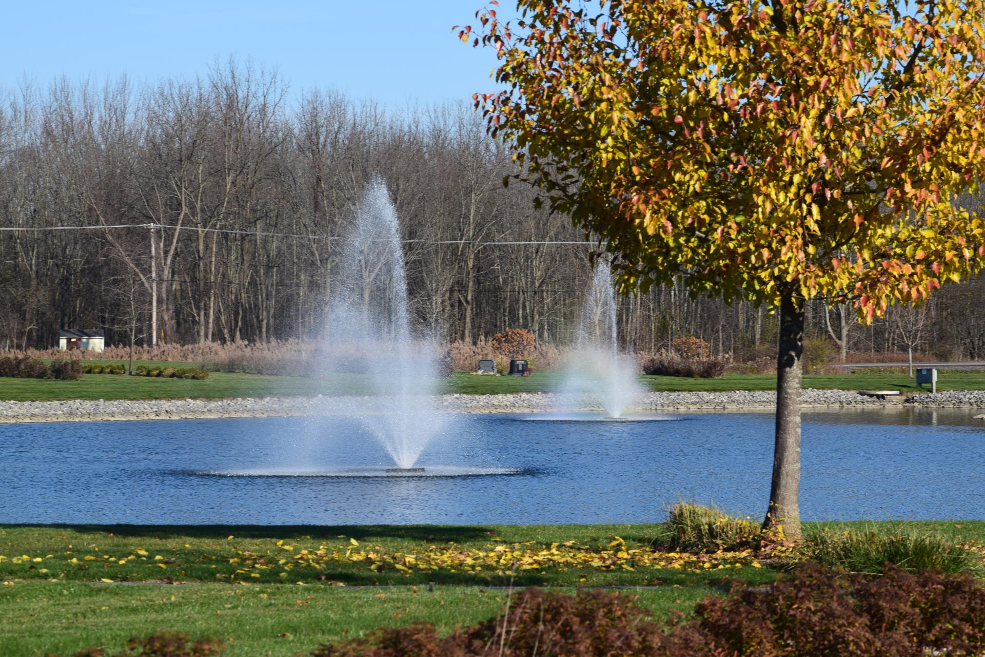 Pond with fountains at Our Lady of Peace Cemetery